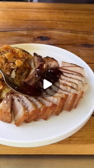 Pork cutlet with shatter-crisp crackling and charred cabbage